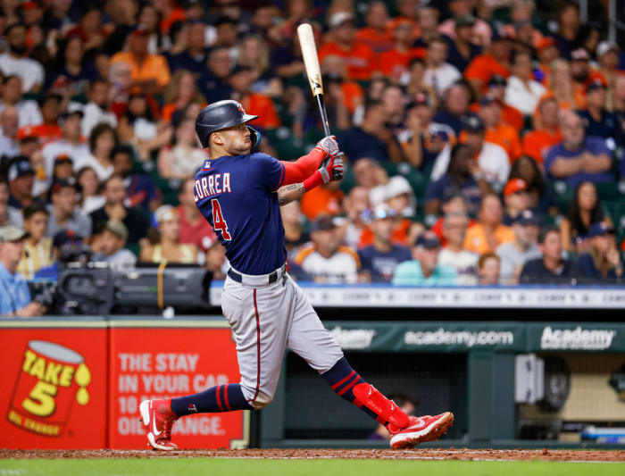 Twins shortstop Carlos Correa hits a single during the seventh inning against the Astros at Minute Maid Park.